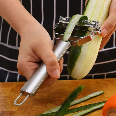 Éplucheur légumes en action